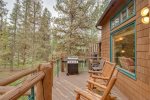 Serene outdoor balcony at Starfire Townhomes providing views of forest